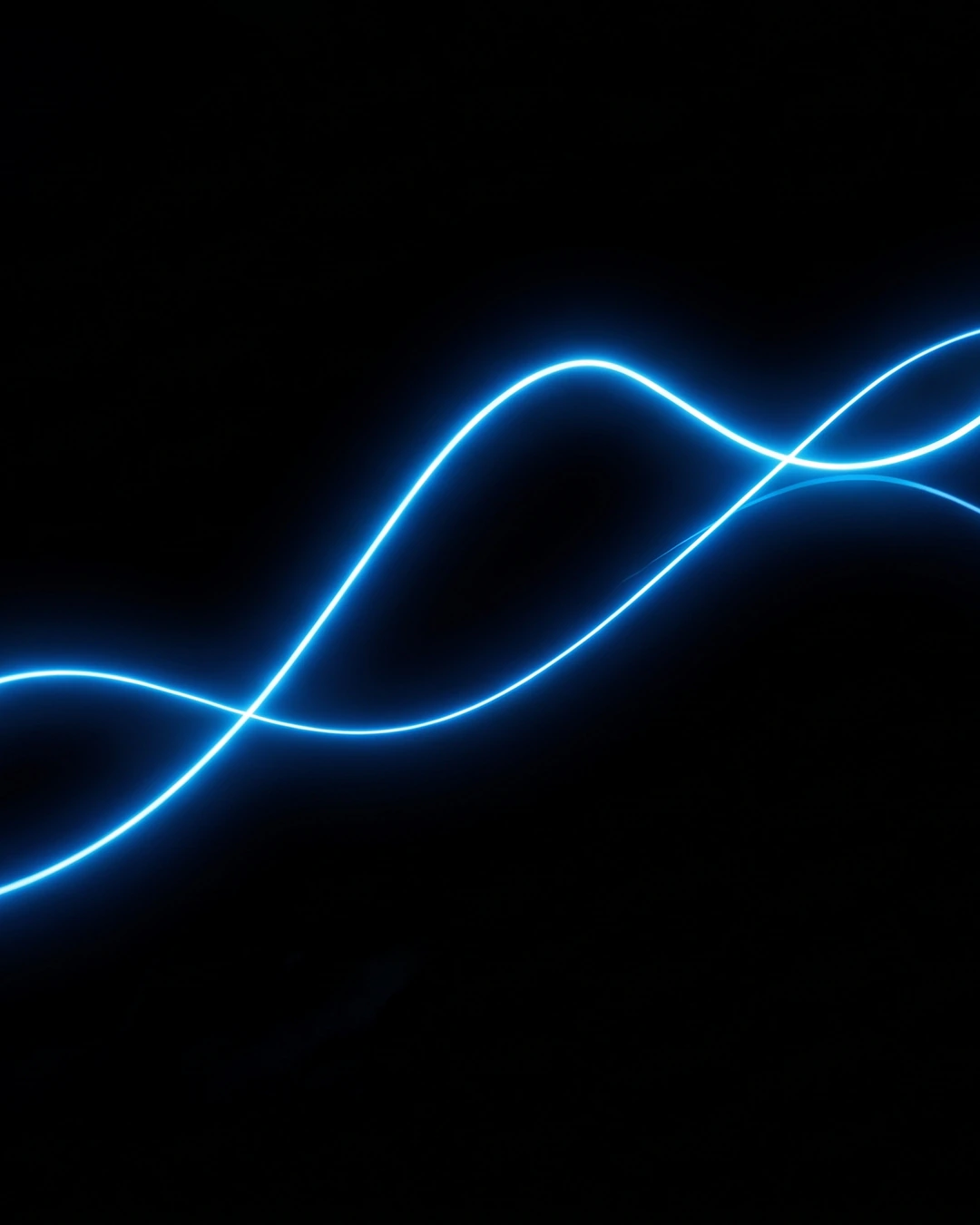 Fundo preto com linhas de luz azul que se cruzam em curva.